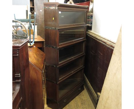 A five section oak Globe Wernicke bookcase, height 66.5ins, width 34ins Condition report: Some rubbing, wear and condition co