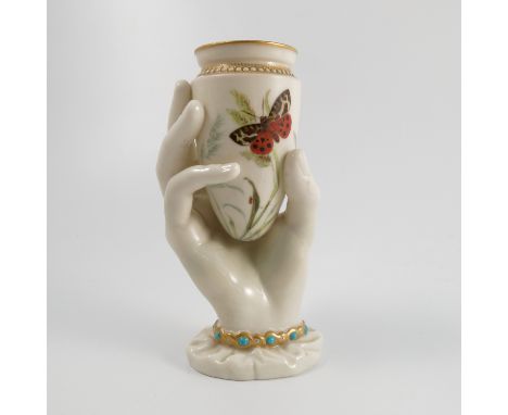 A Royal Worcester vase, moulded as a hand holding an urn, decorated with insects and flowers, impressed marks, height 6.5ins 