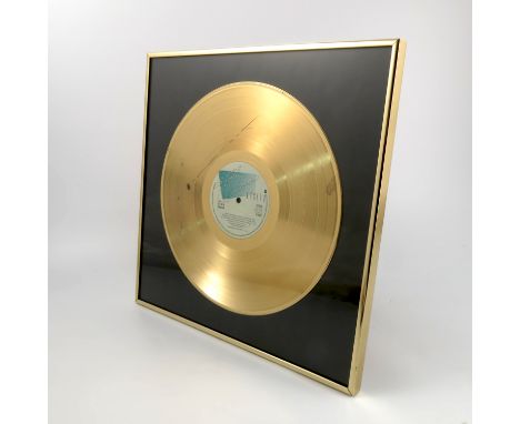 Eagles, Hotel California, framed gold disc Condition report: Behind glass, there is a scratch running from 1 o'clock to 9 o;c