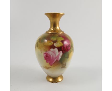 A Royal Worcester vase, with gilt neck and foot rim, the body decorated with roses by Spilsbury, shape number H302, dated 193