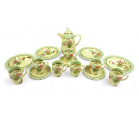 A Clarice Cliff Wilkinson Lynton part coffee set with four bowls in floral Corolla pattern circa 1938, comprising coffee pot,