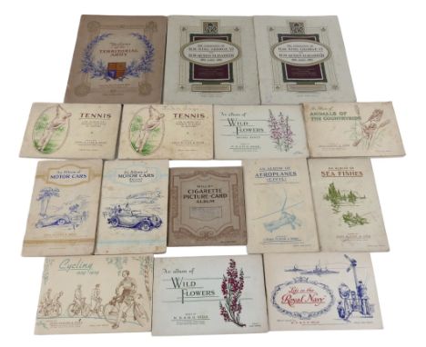 A group of fifteen albums of cigarette cards, including John Player &amp; Sons Tennis, Cycling, Motor Cars, Aeroplanes (Civil