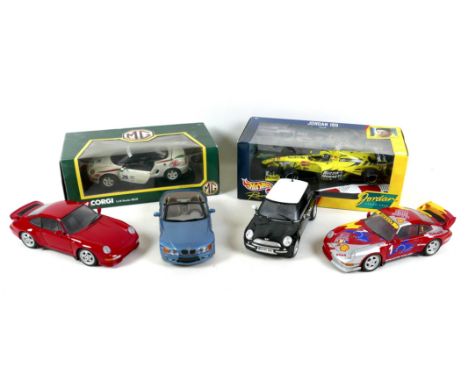 A collection of six 1/18 scale model vehicles, comprising a boxed Corgi MGF, a boxed Mattel Hot Wheels Jordan 199 Grand Prix 