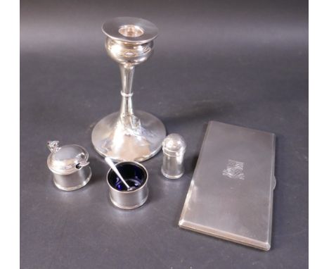A collection of silver ware, comprising a three piece cruet, a weighted candlestick 9 by 14cm high and a masonic presentation