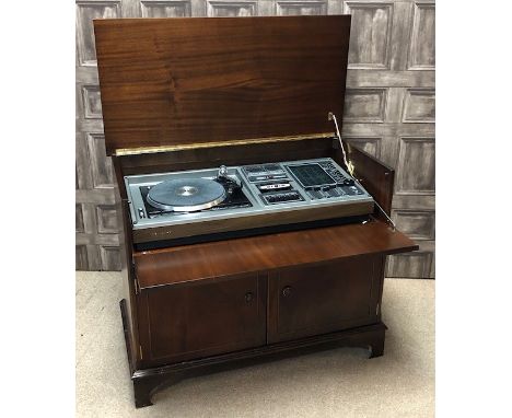 RECORD PLAYER, in a mahogany cabinet