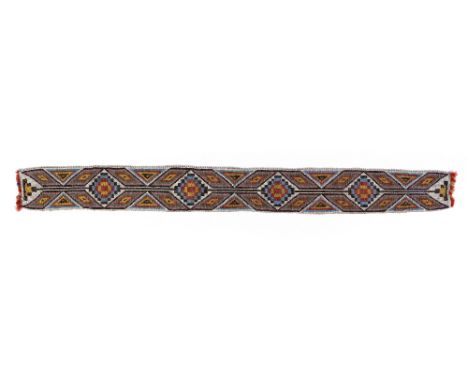 A Mesquakie loom beaded sash Great Lakes, North America coloured glass beads with geometric designs, the ends with red fibre 