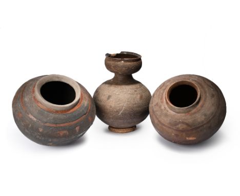 Three Nupe pots Nigeria pottery, including a double gourd pitcher with incised linear and burnished decoration, 42cm high and