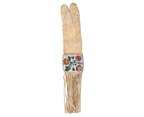 An Ojibwa pipe bag Northeast North America buckskin, coloured glass beads and dyed quill, the four tongue top with sinew stit