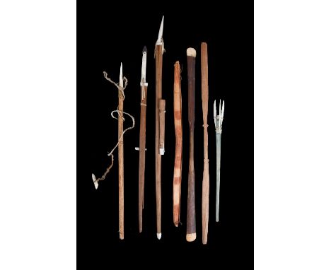 λSeven Inuit model hunting implements Alaska wood, marine ivory and sinew, including a whale hunting harpoon with a metal tip