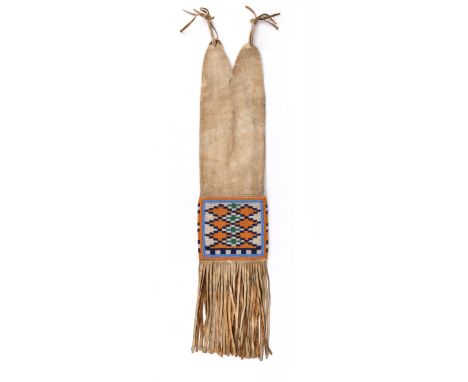 A Plains Cree or Blackfoot pipe bag Northern Plains buckskin and coloured glass beads of differing geometric designs and edgi