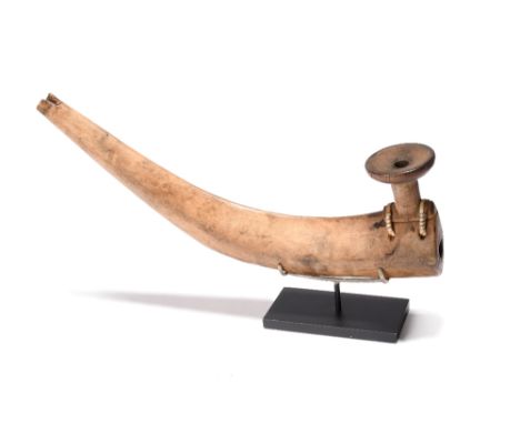 An Inuit pipe Siberia maple, the bowl attached with bird quill, the underside with a removable rectangular panel, 19th centur