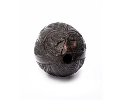 A carved coconut bugbear flask possibly prisoner made, Guyana or New Caledonia with stylised leaf and diaper decoration, 14cm