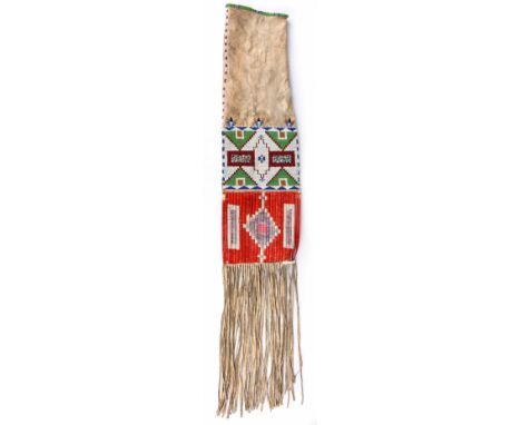 An Arapaho pipe bag Plains buckskin, coloured glass beads and dyed quill, the main panels with differing detailed geometric d