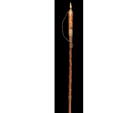 λAn Inuit seal hunting harpoon Alaska cedar, marine ivory, feathers and fibre, the bound head with a detachable barbed tip, t