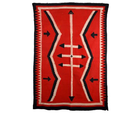 A Navajo Germantown rug Southwest North America the tri-colours with arrow and zig-zag designs, 213cm x 147.5cm. Provenance B