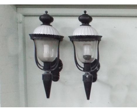 Pair of large black iron and glazed electric wall light fittings - approx 30" tall 
