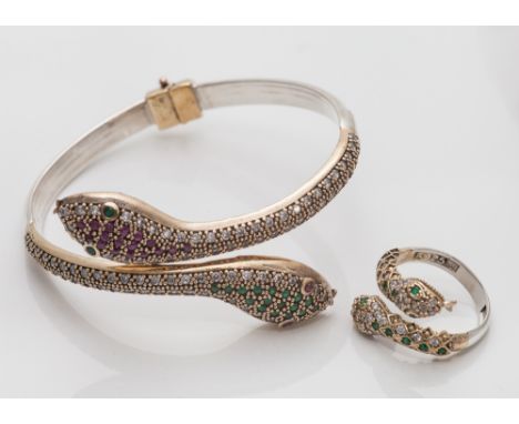 Silver gilt snake design hinged bangle and matching dress ring, set with red & green stones.