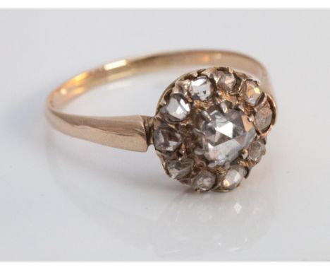 Rose cut diamond circular cluster ring, set in 14 k rose gold setting. Ring size P