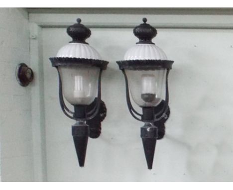 Pair of large black iron and glazed electric wall light fittings - approx 30" tall 