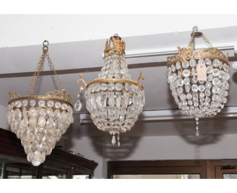 Three assorted brass and glass lustre hanging light shade fittings 