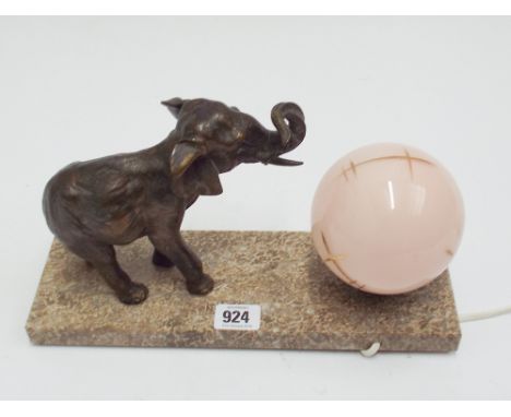 French Art Deco elephant mounted table lamp with pink ball shade on a marble base