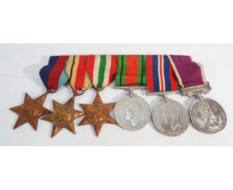 Group of 6 World War 2 medals to include Africa and Italy star, regular army etc. 6 medals in the group   Medal inscribed 105