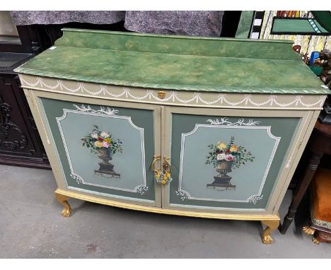 A Beautifully painted Two door console unit. Designed with hand painted urn bouquets to each door, hand painted by Runciman S