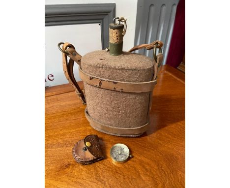 A Military style water flask with leather straps and original cork together with a vintage compass and small case. 