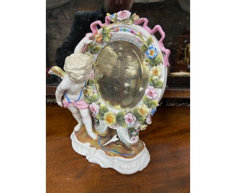 A 19th century Sitzendorf Cherub and floral design mirror. [ 