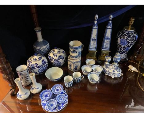 A Selection of Chinese and Japanese blue and white porcelain wares to include a Chinese 19th century mug, pyramid garnitures,