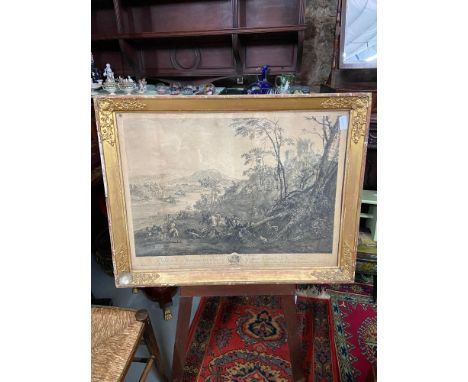 An 18th century engraving print titled 'Les Sangliers Forces' dated 1741, Fitted within a moulded gilt frame. 