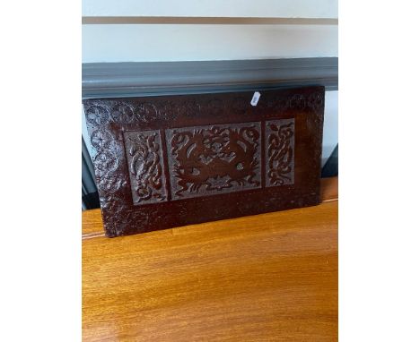 An Arts and crafts hand carved panel depicting Celtic trims and Dragons. [ 
