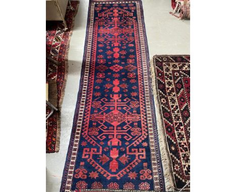 A Persian style hall runner 
