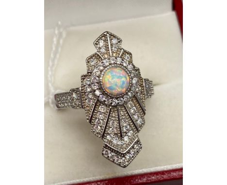 A Beautiful example of a ladies Silver, CZ and Opal panelled dress ring. In an Art Deco Form. [Ring size Q] 