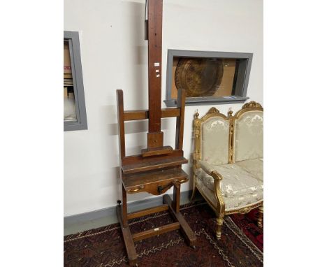A large antique Newman's [24 Soho Square London] artists easel. Designed with a hand crank mechanism. In a working order. 