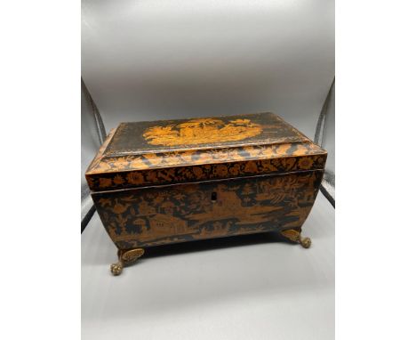 Antique Oriental ornate tea caddy. Designed with brass claw feet. [ 