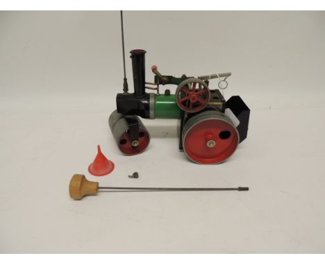 A Mamod live steam road roller, unboxed, with steering rod, funnel and burner