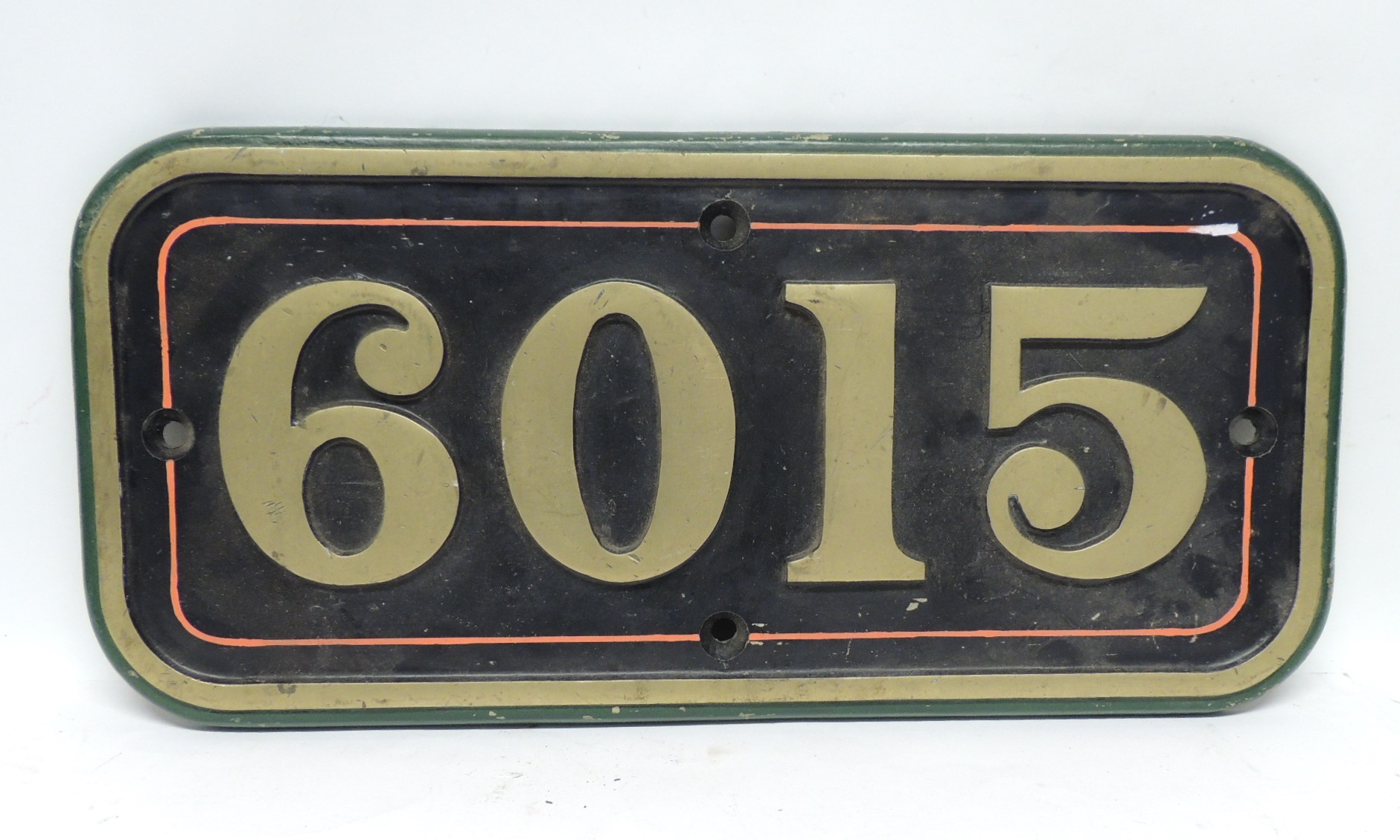 A heavy replica GWR steam plate number 6015, painted brass