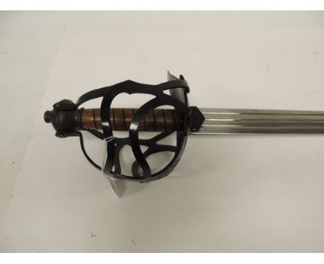 A reproduction broadsword type weapon with black open work metal hilt, wire bound wood grip, broad fullered blade, blade 84cm