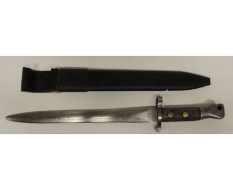 A bayonet with wood grip, straight blade with numerous stamps to the top of the blade, length of blade 28.5cms, in made-up sc