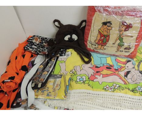 The Flintstones ladies scarf c.1994; a vintage Flintstones cushion; a Huckleberry Hound pillow case in original packaging; a 