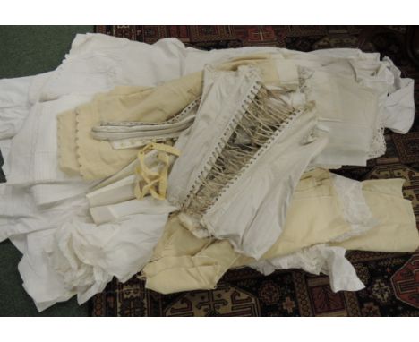 A large quantity of ladies white cotton underwear including corsets, night gowns, petticoats, skirts; babies gowns, light woo