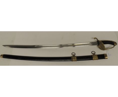 A reproduction of a "Gendarmerie Royale" sword, having decorative brass hilt, the blade marked in yellow lettering "Genrdarme