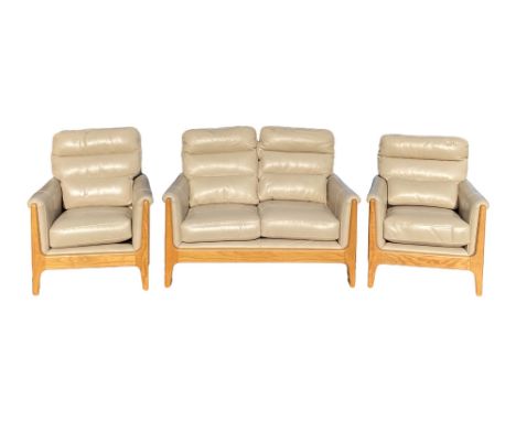 CINTIQUE LYDIA TWO SEATER SOFA, leather effect in mushroom tone, 95cms H, 126cms W, 83cms D the seat and a pair of matching a