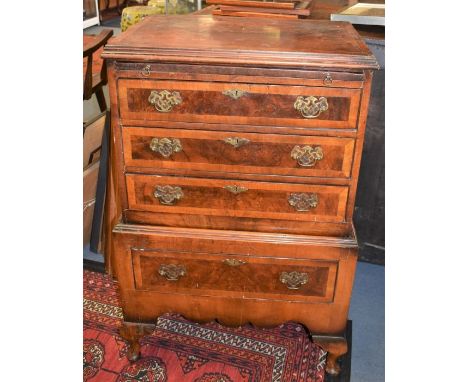 Small mahogany 19th century chest on chest with pull out vanity shelf, three drawers above base with single drawer on padded 