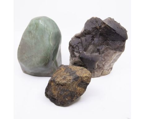 A tumbled boulder of green aventurine quartz, along with another rock possibly gold coloured flecks, and a brown crystal in m