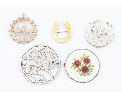 A collection of five silver brooches to include a silver harness ornament replica Quendale Shetland, Mizpah, Victorian silver