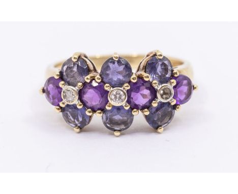 An iolite, amethyst and diamond set  9ct gold cluster ring, claw set with round cut stones, the centre set with small diamond