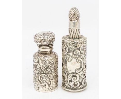 A late Victorian silver mounted scent bottle, the body profusely chased and pieced, domed stopper (AF - damages), hallmarked 