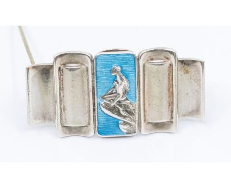 JTH Jens Tage Hansen: a Danish silver and enamel brooch, the centre with aqua enamel with embossed mermaid decoration, each s